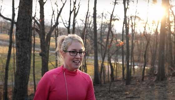 Kristine smiles on a run after her surgery.