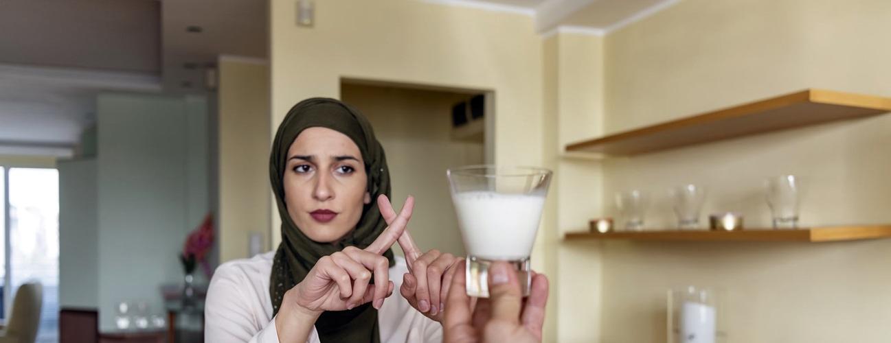 Woman rejecting milk
