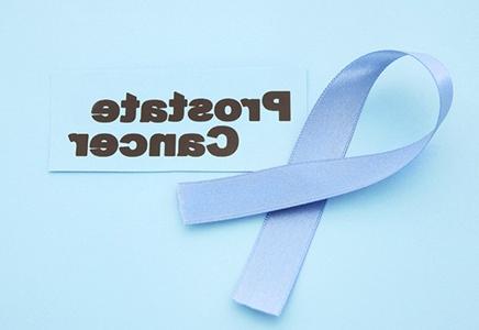prostate cancer lettering with ribbon