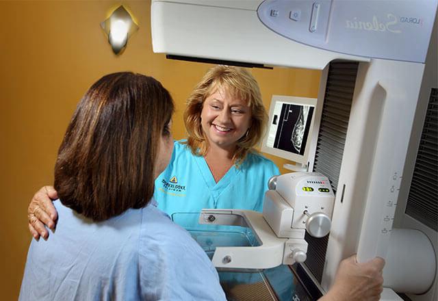 woman recieving a mammogram