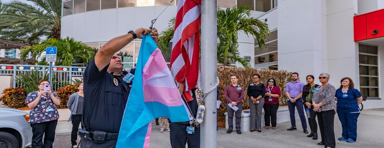 Raising the transgender pride flag to commemorate the 2018 Transgender day of awareness at Johns Hopkins All Children's Hospital