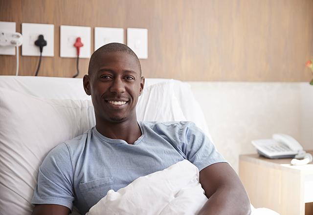 johns hopkins surgery - man smiling in hospital bed